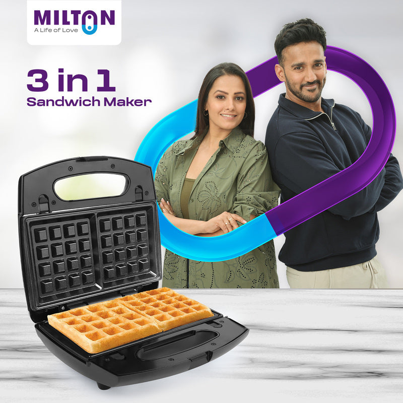 Milton Royal X 3-in-1 Sandwich Maker with black body and indicator lights on top.”