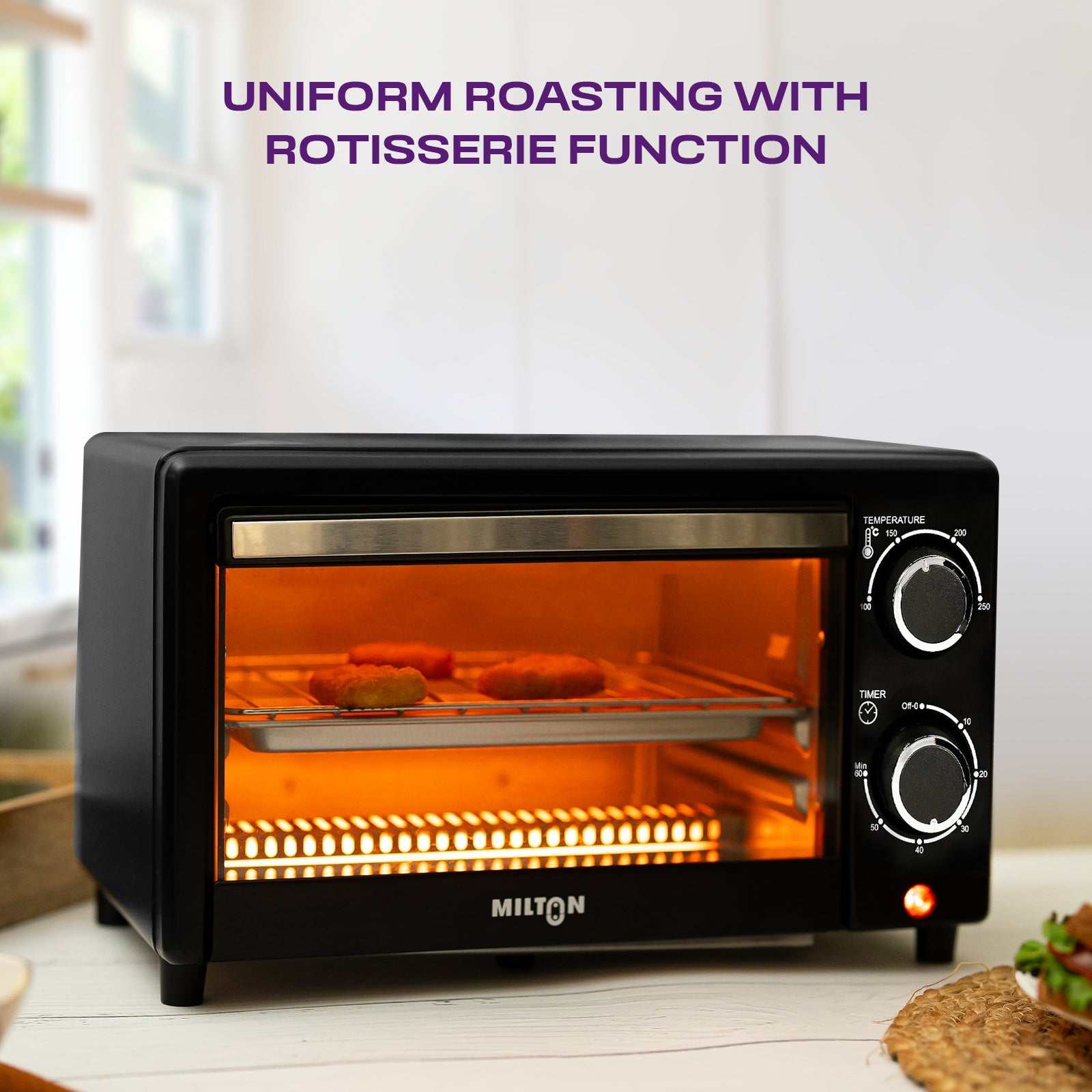 Milton 10L Oven Toaster Griller with heat-resistant glass door and compact stainless steel body.
