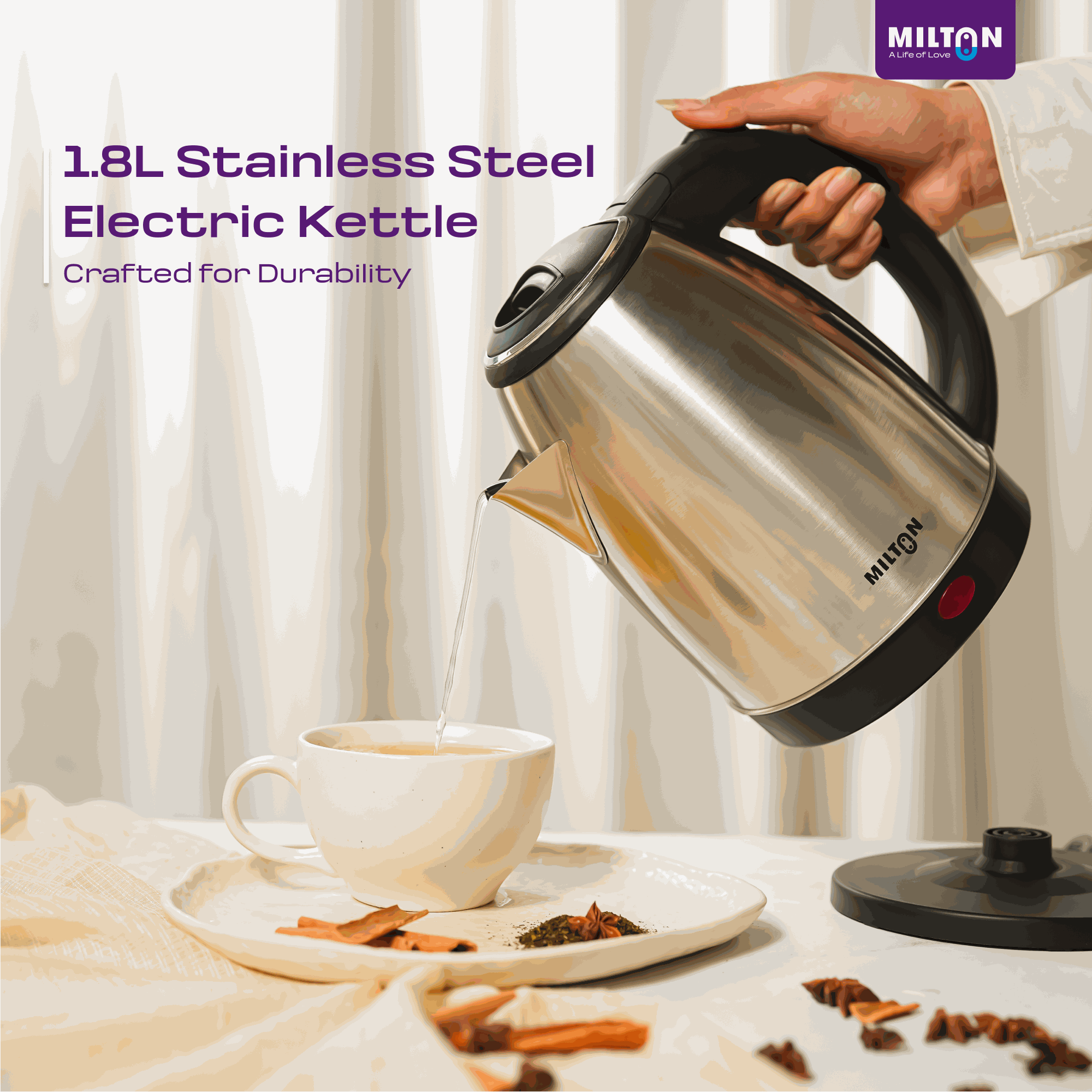 Milton hot water Rapid Electric Kettle pouring boiled water cleanly into a cup, demonstrating safe and spill-free design.